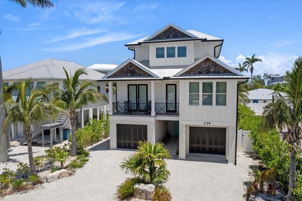 Photo of 239 S Harbor Drive, Holmes Beach, FL 34217 (MLS # A4704768)