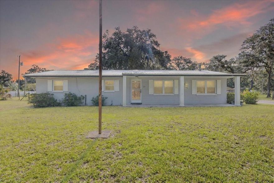 *Seller offering $2,500 credit toward buyers closing cost, prepaids OR rate buy down with acceptable offer! Welcome to the quiet calm pace of Chiefland Florida, this concrete block SOLID home is the perfect starter home or forever home, located on over an acre of gorgeous land just outside of town. Extremely well kept home , move in ready as you enter the door you will fall in love with the bright open floor plan. Gorgeous tile (looks like wood) flooring through out as well as laminate in the bedrooms . Spacious living room, spacious kitchen with laminate countertop and real wood cabinetry with a large space for dining room table. Laundry room is spacious with additional space for storage. A wonderful additional room perfect for another sitting area or room for entertaining with an exit door as well, this room has a gorgeous brick accent wall. 3 total bedrooms and one bathroom , each bedroom offers ample space and there is plenty of room off the master to add a second bathroom if desired. Back porch with plastic exterior windows perfect for enjoying the year round Florida temps , along with a TV to watch while enjoying the peaceful back yard. Outside is the yard lovers dream. A gorgeous canvas to plant you a nice garden, raised beds and plenty of room for the pets to roam freely with the fenced back yard. A nice oversized enclosed concrete block garage, perfect for parking your vehicles and toys , space for workshop and storage with a 220 volt outlet. Out back you have a wooden pole barn with lean too perfect for parking the mower and storing yard stuff. This home is located on a dead end road ensuring little traffic and is a short drive to town. Minutes to the Manatee Springs State Park, minutes to the Suwannee River and local Golf and Country Club. Call today for YOUR tour! ALL LOANS WELCOME!