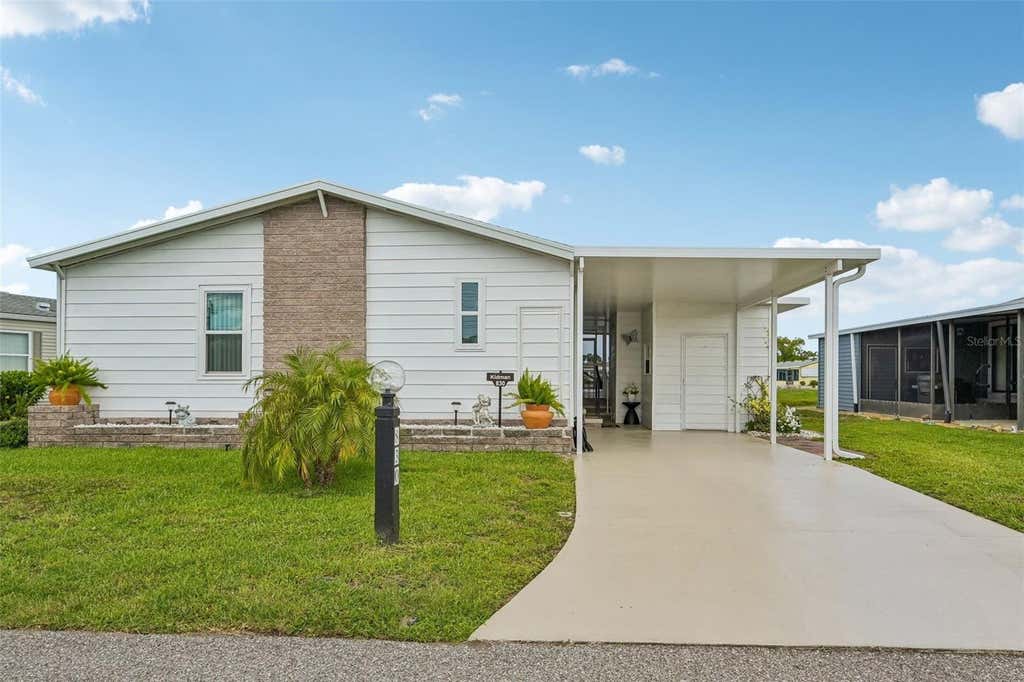 Photo of 830 Seabrooke Drive, Englewood, FL 34223 (MLS # TB8518356)