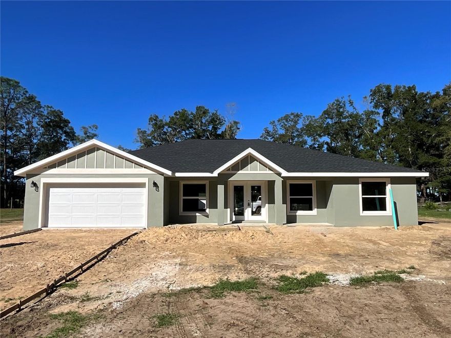 Under Construction. Experience the charm of country living with this beautifully crafted new construction home, offering 4 bedrooms, 3 bathrooms, and a versatile bonus room on 1.17 acres in Rolling Hills. 
Step inside to find an inviting open-concept layout with high ceilings in the main living area, creating a spacious and airy atmosphere filled with natural light. The kitchen features quartz countertops, wood, soft close cabinets, stainless steel appliances and a large island perfect for gathering and entertaining. 
The primary suite has been thoughtfully designed to include dual walk-in closets, double sink vanity and a luxurious walk-in shower. 
A bonus room with corner barn doors offers flexibility for use as an office, playroom, or media space. Additional upgrades include luxury vinyl plank flooring, glass shower enclosures, and quality finishes throughout. 
Enjoy peaceful views from your covered back porch of the neighboring farm. This home perfectly blends modern comfort with rural beauty-move in ready and designed with thoughtful details throughout.   
Close proximity to WEC, HITS, major highways, hospitals, restaurants. 
Changes were made to the original floor plan. Some photos are not of the actual home but similar model. Please contact listing agent Solveig Cumston first and see attached floor plan in pictures for actual changes.