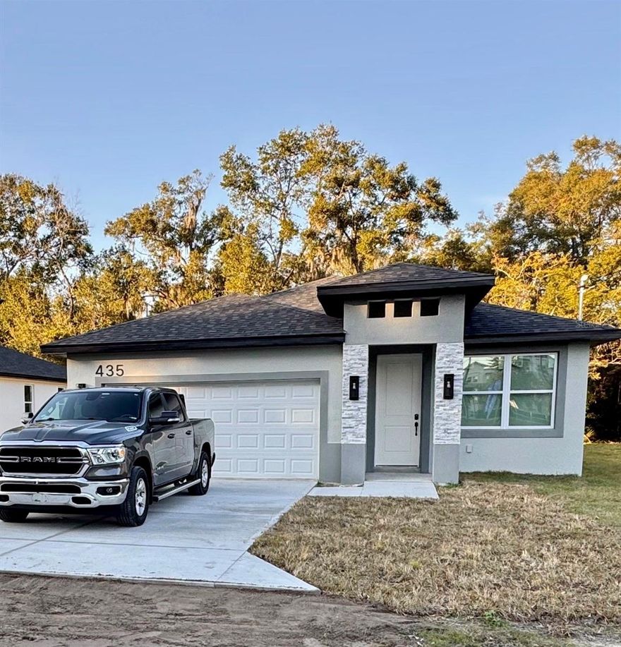 Stunning brand-new construction offering modern design and quality craftsmanship in an Apopka neighborhood. This
thoughtfully designed home features a sleek contemporary exterior, concrete driveway, and professional landscaping. Inside, enjoy an openconcept floor plan filled with natural light, luxury vinyl plank flooring, and designer finishes throughout. The chef’s kitchen showcases quartz countertops, shaker cabinetry, a stylish tile backsplash, built-in oven and microwave, modern range hood, and a large island perfect for
entertaining. The kitchen flows seamlessly into the living and dining areas, creating an ideal space for everyday living. Spacious bedrooms,
beautifully finished bathrooms, and all-new systems provide comfort, efficiency, and peace of mind. Conveniently located near shopping, dining ,major roadways, and downtown Apopka. Schedule your private showing today!