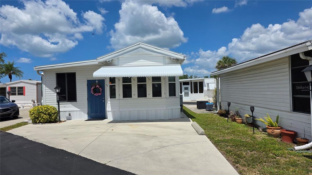Photo of 1674 University Pkwy Lot 129 Pkwy, Sarasota, FL 34243 (MLS # A4691593)