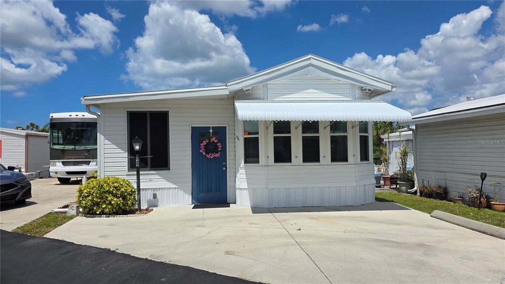 Photo of 1674 University Pkwy Lot 129 Pkwy, Sarasota, FL 34243 (MLS # A4691593)