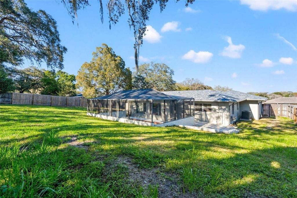 Photo of 7370 Holiday Drive, Spring Hill, FL 34606 (MLS # W7881310)