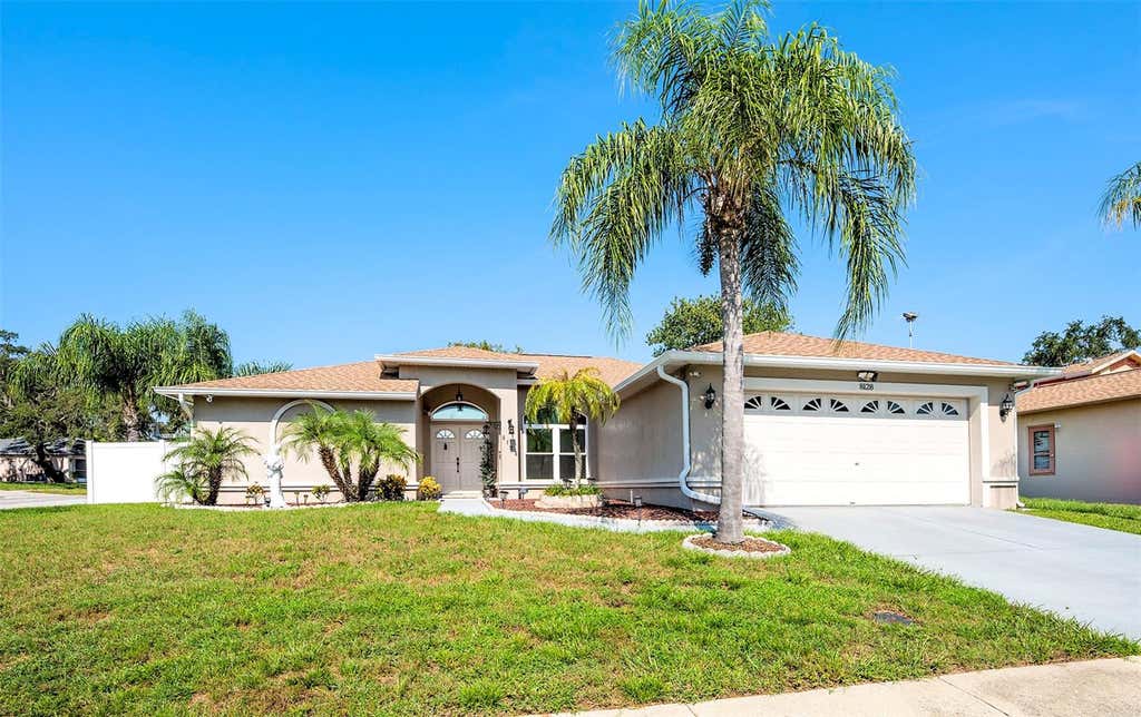 Photo of 8128 Golden Bear Loop, Port Richey, FL 34668 (MLS # W7888487)