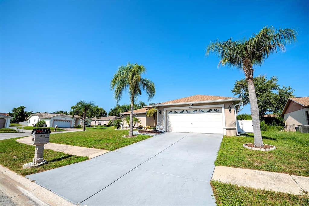 Photo of 8128 Golden Bear Loop, Port Richey, FL 34668 (MLS # W7888487)