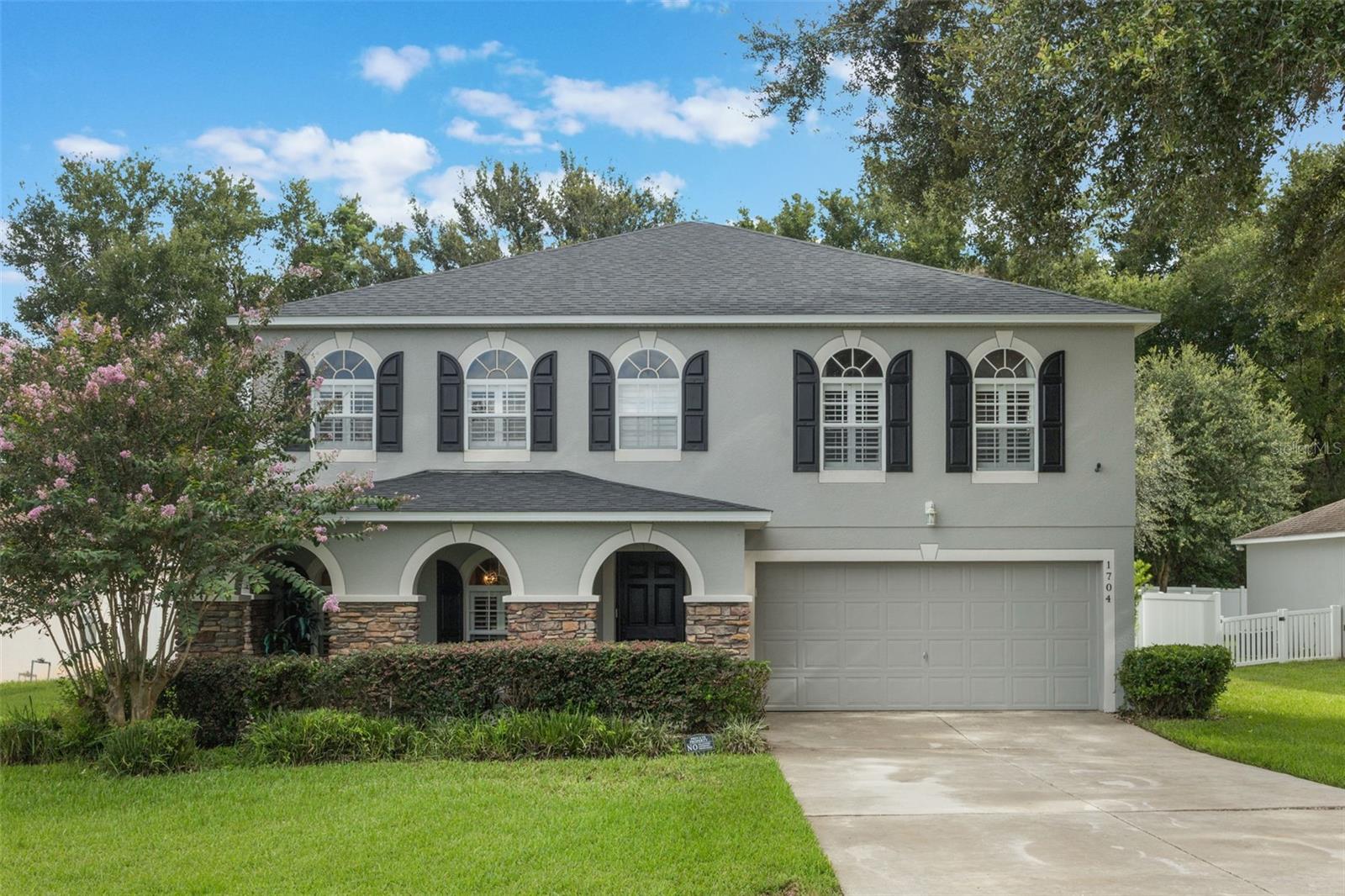 Beautiful 2-Story Home with Private Backyard Oasis
This immaculate 2-story home offers stunning curb appeal with its stone-front exterior and welcoming front porch. Step inside to discover an elegant, well-maintained interior filled with natural light, an open layout, and thoughtful details throughout. The gourmet kitchen features a walk-in pantry and flows seamlessly into the living and dining areas — perfect for everyday living and entertaining. Upstairs and downstairs are both served by two HVAC systems, keeping the home comfortable and energy efficient year-round. Outside, enjoy your own private retreat with a fully fenced backyard and no rear neighbors — ideal for relaxing, gardening, or entertaining. Meticulously cared for and move-in ready, this home combines style, comfort, and efficiency in one perfect package.
*** New Roof 2024, Upstairs A/C replaced 2021, Air & Irrigation smart controlled via phone. Washer/Dryer 2025 **
** Home can purchased fully furnished. ***