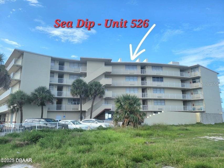 Top Floor, Super cozy unit. Nicely staged with blue scheme furniture, conveniently equipped to accommodate you. Large window overlooking the ocean and the city. Own this place for vacationing in Daytona or use it as an investment property! Onsite management is available if you choose to use their services. No Rental restrictions. The monthly fee covers all your utilities, water, electric & Wi-Fi. Heated Indoor pool & oceanfront pool to enjoy all year round. Convenience is at your doorstep, with a variety of beachside restaurants, shopping malls, and entertainment events just moments away. Take advantage of the proximity to all the services you need while relishing in the joy of coastal living. Seize the opportunity to make this beach retreat yours. Schedule a viewing and figure the investment potential of this unit.