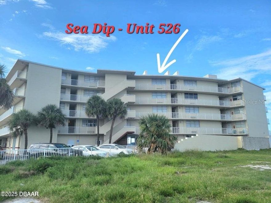 Top Floor, Super cozy unit. Nicely staged with blue scheme furniture, conveniently equipped to accommodate you. Large window overlooking the ocean and the city. Own this place for vacationing in Daytona or use it as an investment property! Onsite management is available if you choose to use their services. No Rental restrictions. The monthly fee covers all your utilities, water, electric & Wi-Fi. Heated Indoor pool & oceanfront pool to enjoy all year round. Convenience is at your doorstep, with a variety of beachside restaurants, shopping malls, and entertainment events just moments away. Take advantage of the proximity to all the services you need while relishing in the joy of coastal living. Seize the opportunity to make this beach retreat yours. Schedule a viewing and figure the investment potential of this unit.