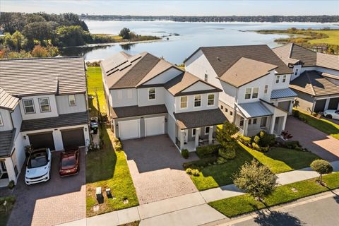 Photo of 7386 Alpine Butterfly Lane, Orlando, FL 32819 (MLS # O6367603)