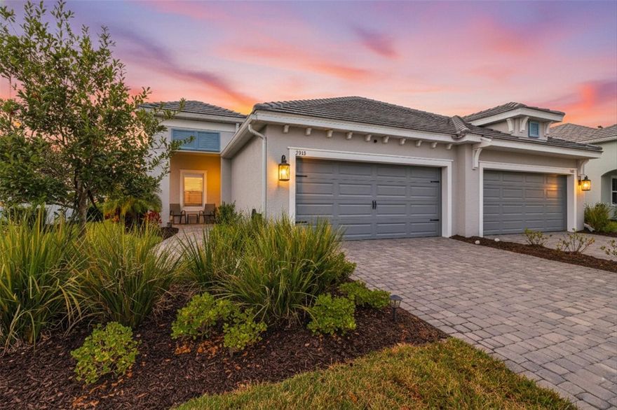 Welcome to luxury living wrapped in resort-style comfort in the heart of Windward at Lakewood Ranch, one of Sarasota’s most sought after gated communities. This like new home built in 2023 offers all the benefits of new construction without the wait, making it an ideal choice for a primary residence or part time Florida living. Tucked away on a quiet cul-de-sac with sidewalks throughout the neighborhood, the home greets you with beautiful landscaping, strong curb appeal, a large pavered driveway, and a welcoming screened front porch. Inside, over 1,500 square feet of thoughtfully designed living space features 2 bedrooms, 2 bathrooms, a 2 car garage, and a versatile bonus room with French doors that can easily function as a den, office, or guest space. The split floor plan is perfect for hosting visitors, while the open concept living area brings everyone together with a spacious kitchen showcasing quartz countertops, a large island, stainless steel appliances including a gas range, and a classic subway tile backsplash. The living room features a tray ceiling and sliding glass doors that lead to the extended screened and pavered lanai, offering a private outdoor retreat with no rear neighbors. The primary suite is generous in size and includes two closets, double vanities, a walk-in shower, and a custom walk-in closet. An indoor laundry room adds convenience to daily routines.

Windward elevates everyday living with an impressive array of resort-style amenities, including two sparkling pools, a fitness center, a 9,600 square foot clubhouse, tennis courts, eight pickleball courts, dog parks, a playground, community events, and miles of scenic walking trails. The HOA includes lawn maintenance and full access to all amenities. This location also places you minutes from Waterside Place’s lively Main Street, top-rated schools, I-75, the UTC mall, downtown Sarasota, an incredible variety of restaurants, and world-renowned Gulf Coast beaches. Do not miss your chance to experience one of Lakewood Ranch’s most vibrant and beautifully maintained communities at its finest.