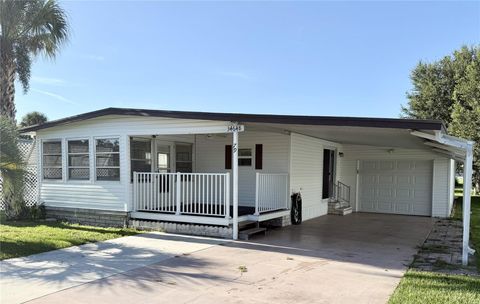 Photo of 34648 Sweetpea Lane, Zephyrhills, FL 33541 (MLS # TB8417789)