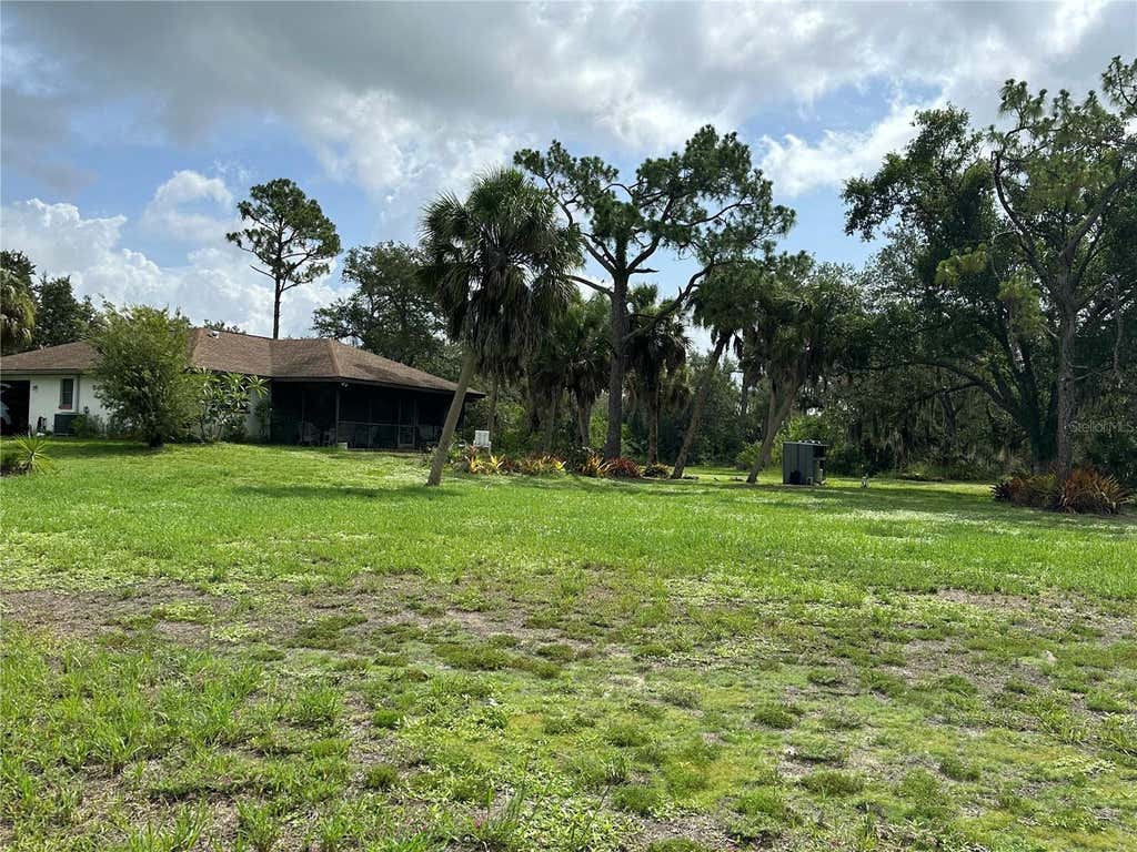 Photo of 13075 Batlin Avenue, Port Charlotte, FL 33953 (MLS # C7528845)