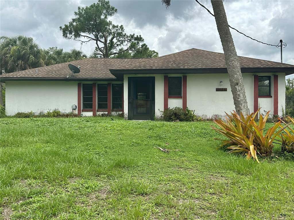 Photo of 13075 Batlin Avenue, Port Charlotte, FL 33953 (MLS # C7528845)