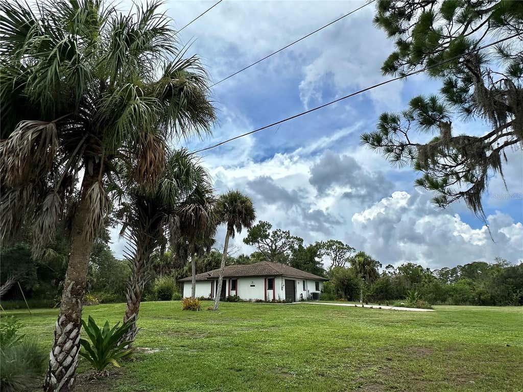 Photo of 13075 Batlin Avenue, Port Charlotte, FL 33953 (MLS # C7528845)