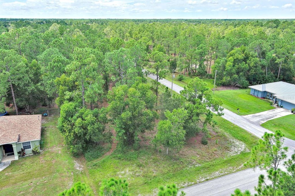 Photo of 1400 E 11th Street, Lehigh Acres, FL 33972 (MLS # O6344051)