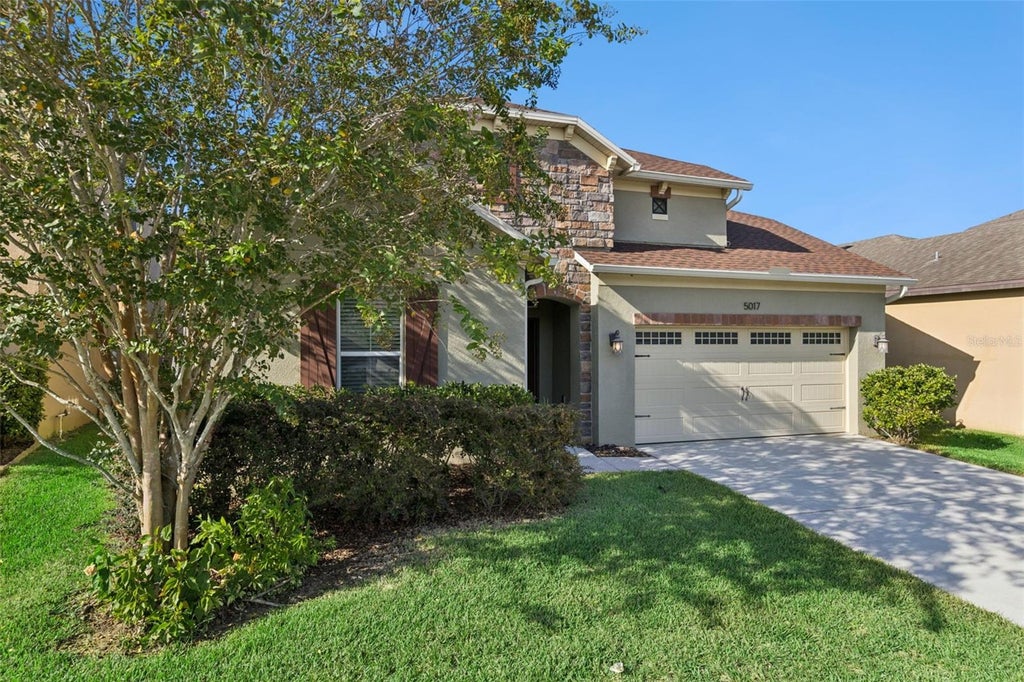 Photo of 5017 Torchwood Dr, Minneola, FL 34715 (MLS # O6441474)
