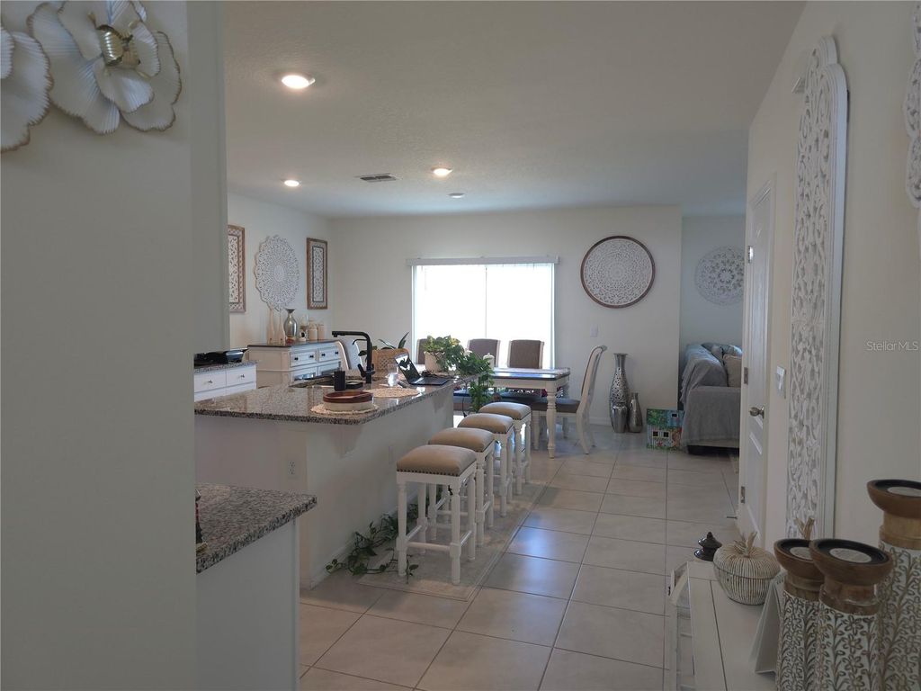 Photo of 680 Griffon Avenue, Lake Alfred, FL 33850 (MLS # O6331228)