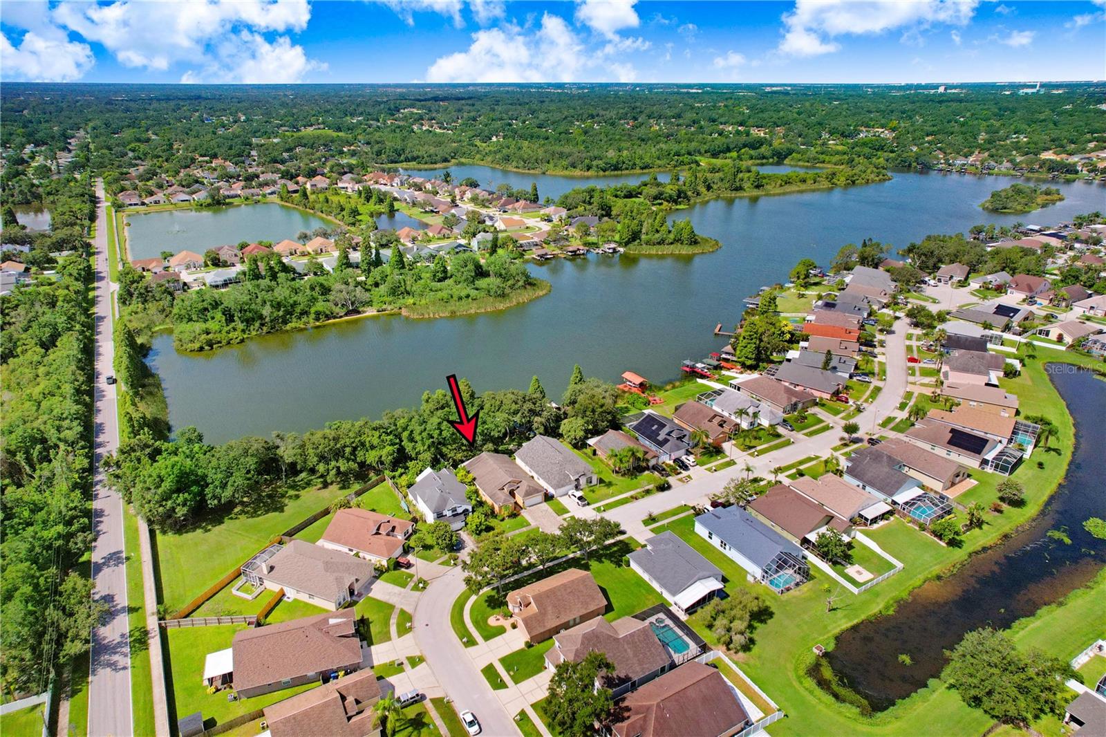 Have you ever dreamed of owning a home on a private lake for boating, skiing, tubing, fishing, or canoeing? This home offers just that—along with a spacious dock and a boathouse featuring a 10,000 lb electric lift—right in the heart of Brandon, Florida.
This beautiful 3-bedroom, 2-bathroom retreat is ideal for those seeking a peaceful escape from the stresses of everyday life. As soon as you step inside, you’re greeted by breathtaking views of Mango Lake, a pristine 80-acre lake reserved for your enjoyment.
Move-in ready, this exceptional lakefront home has no CDD fees and a low HOA fee.
Just a few of the upgrades include: a newer HVAC system, a large dock with composite flooring, a boathouse with lift, re-designed primary bedroom closet - new fencing, stone pavers installed on the driveway along with the exterior patio and walkways, solid counter tops in kitchen, gas stove plus much more.
Lakefront homes with private docks rarely become available in this community. Don’t miss this opportunity—schedule a showing today! You won’t be disappointed.
