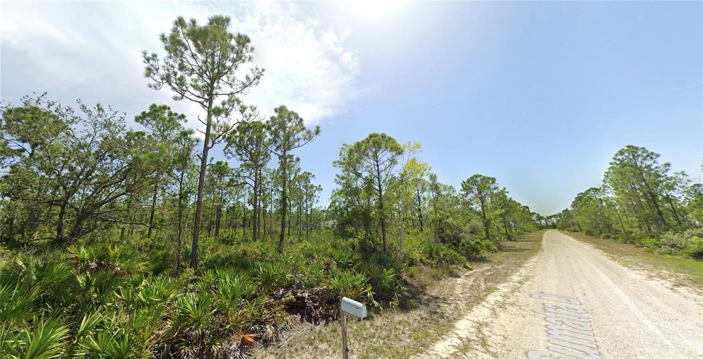 Photo of 27095 Sumatra Drive, Punta Gorda, FL 33955 (MLS # O6296799)