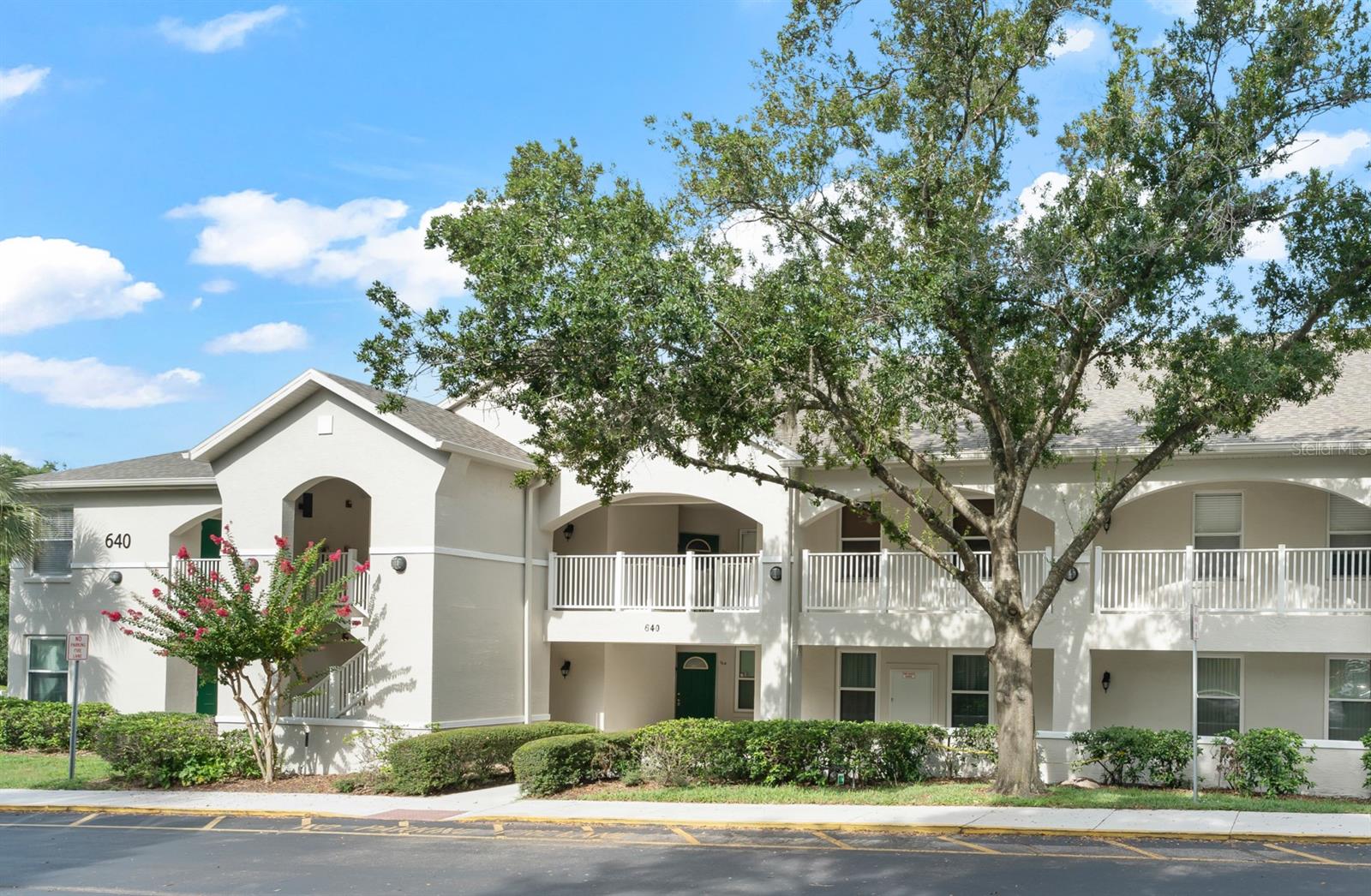 Welcome to Cranes Roost Condominiums, ideally located in the heart of Altamonte Springs—just minutes from Cranes Roost Park, the Altamonte Mall, Uptown Altamonte, and a variety of dining, shopping, and entertainment options. With easy access to I-4 and nearby commuter routes, this central location offers a seamless drive to Downtown Orlando, Maitland, and Winter Park. This ground-floor unit features 3 bedrooms, 2 full bathrooms, and 1,267 square feet of thoughtfully designed living space. The kitchen includes stainless steel appliances and opens directly to the spacious family room, creating a warm and functional layout for everyday living. The primary bedroom is privately situated at the rear of the unit and offers a walk-in closet, a fully renovated ensuite bathroom, and sliding doors that lead out to a screened-in porch with no rear neighbors. Down the hall are two additional bedrooms, one of which features a large Murphy bed—perfect for a home office or guest room—alongside a full guest bathroom with a tub/shower combo. Additional highlights include in-unit laundry, a covered carport space, and a peaceful outdoor patio area. The community offers a well-maintained pool, beautifully landscaped grounds, and exterior building maintenance, all included in the monthly condo fees. This is a wonderful opportunity for a buyer seeking low-maintenance living in a vibrant and walkable location.