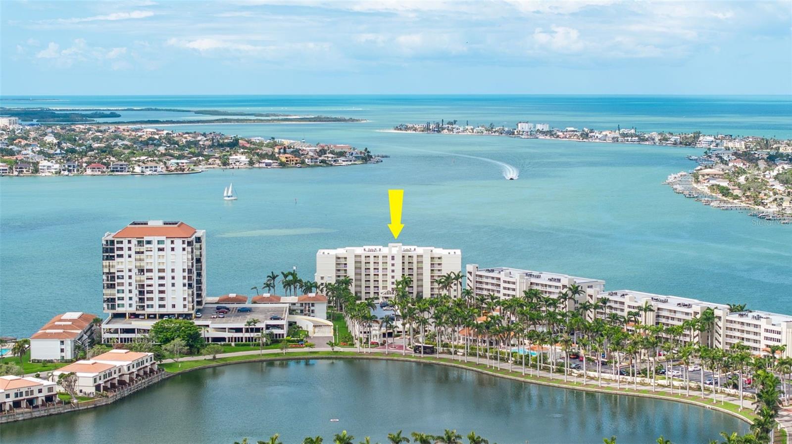 Welcome to Club Bahia Vista, located in the most recently constructed and sought-after building in the community. This elegant 2-bedroom, 2-bathroom condo offers stunning open water views, with two spacious balconies equipped with hurricane shutters. Enjoy exclusive amenities including a heated pool, fitness center, clubhouse, and spa. Recent updates include a 2022 air conditioning system, a remodeled second bathroom, custom plantation shutters, remote-controlled fans, and fresh interior paint. The kitchen is centrally located, featuring white cabinetry, stainless steel appliances, and a breakfast bar, ideal for entertaining. The master suite includes a large ensuite bath, two closets, and a private balcony. Situated on Isla Del Sol, this property offers easy access to downtown St. Petersburg, Tampa International Airport, and St. Pete Beach. Contact us today to schedule your private viewing.