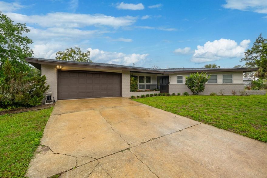Live the Space Coast lifestyle in this beautifully updated 3-bed, 2.5-bath home. The renovated kitchen shines with stainless steel appliances, granite counters, and a spacious pantry. All bathrooms feature modern fixtures and fresh tile. Striking original terrazzo floors add a mid-century modern touch, wood-look laminate flows throughout the main living areas and plush carpet adds comfort to every bedroom. The primary suite offers dual closets and a private en suite bath. The living room showcases a brick wood-burning fireplace and high ceilings. A 2022 roof and 2-car garage complete the package, while the oversized lot delivers a serene backyard with mature landscaping, a storage shed, and a patio made for entertaining. Centrally located in Titusville, minutes from shopping, dining, and front-row rocket launch views. Kennedy Space Center is 15 minutes away, Cape Canaveral and Port Canaveral within 30 and Orlando's attractions are less than an hour's drive. Schedule your showing today!