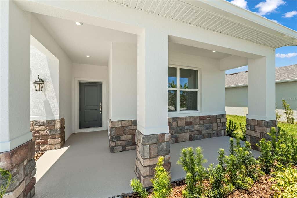 Photo of 1833 American Way, Haines City, FL 33844 (MLS # O6432649)