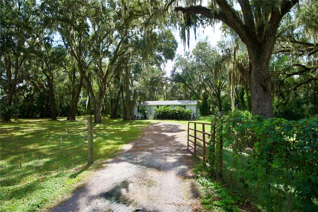 Photo of 10424 Tami Trail, Hudson, FL 34669 (MLS # W7879774)
