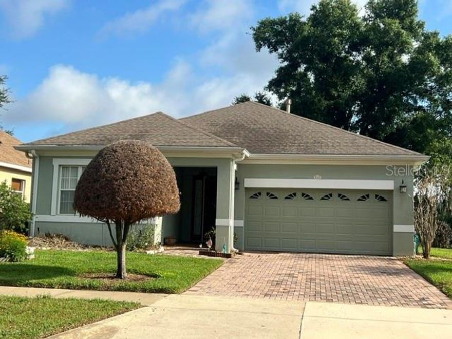 3-6 month fully furnished rental, includes everything but phone. Includes: AC, heat, electric, water, gas, trash pickup, all clubhouse facilities and all yard maintenance. Gorgeous panoramic views of the 4th Fairway of Clermont National Golf Course! This truly one-of-a-kind home has been thoughtfully enlarged beyond the standard design and offers exceptional indoor and outdoor living. The home features 2 bedrooms, 2 baths, and a versatile den, along with a 2-car garage. Highlights include an elegant front door with a glass side panel, and abundant natural light throughout. The kitchen offers tile flooring, 42” oak cabinets, a gas stove, double closet pantry, porcelain double sink, and a charming eat-in kitchenette. An inside laundry room includes washer, dryer, extra storage shelving, and a convenient walk-in design. The primary suite features engineered wood flooring, a bay window, two large walk-in closets, and a spa-like bath with private commode, walk-in shower, garden tub, double vanities, and a new comfort-height toilet. The second bedroom and den are carpeted, with bay windows in both the den and second bedroom. The dining room is accented by a stunning chandelier. The living room showcases breathtaking golf course views, golf-cart-friendly community, residents enjoy a 28,000 sq. ft. clubhouse with 8 clay lighted tennis courts, 7 new pickleball courts, state-of-the-art fitness center, indoor and outdoor heated pools, billiards room, card rooms, arts & crafts studio with kiln, ballroom with stage and dance floor, shuffleboard, bocce, and the “19th Hole” featuring a movie and book library. The 18-hole golf course, driving range, and “The View” restaurant and bar complete the resort experience. The HOA includes 24-hour manned gate security, all clubhouse amenities, full yard maintenance, cable TV, and high-speed internet. Built by Levitt & Sons, the community consists of 769 single-family homes. Perfectly located near the Florida Turnpike, bike trails, shopping, hospital, library, restaurants, lakes, Disney, and Orlando International Airport. Nestled in the rolling hills of Clermont, safely inland and away from coastal hurricane zones. Priced reasonably—schedule your private showing today and discover one of Florida’s best-kept secrets.