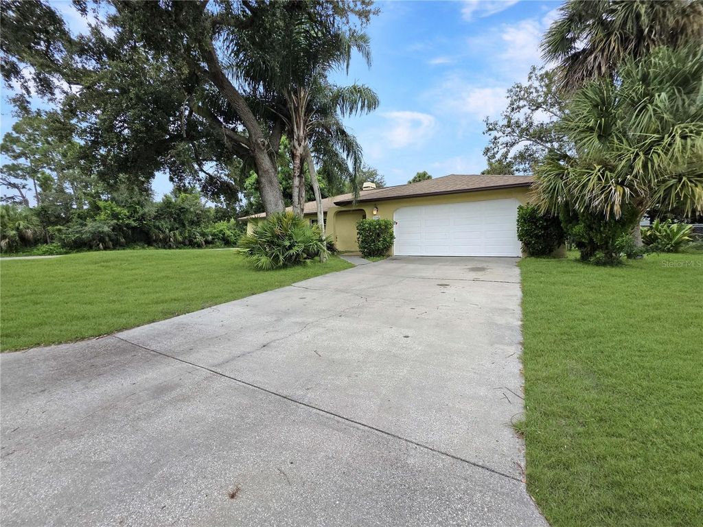 Photo of 1205 Yorkshire Street, Port Charlotte, FL 33952 (MLS # C7514390)
