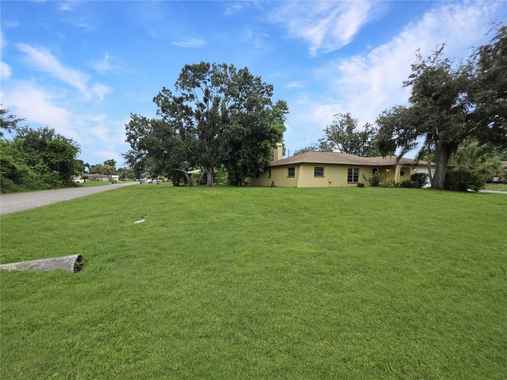 Photo of 1205 Yorkshire Street, Port Charlotte, FL 33952 (MLS # C7514390)