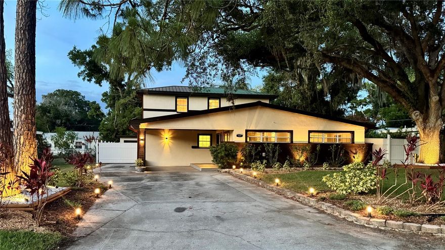 Welcome to 929 West Beacon Avenue, a spacious Tampa home located in the desirable Wellswood area. Offering 3 bedrooms, 2 bathrooms, 2,374 sq ft, a flexible great room, and a two-story layout, this home blends original character with thoughtful modern updates and comfortable everyday functionality.
Inside, you’ll find a bright open layout filled with natural light, updated kitchen and bathrooms, generous living areas, and a flow designed for both daily living and entertaining. The metal roof adds long-term value, while the versatile great room provides additional flexibility for a home office, media room, playroom, or lounge.
As the sun sets, the property truly comes to life with beautiful exterior lighting and a warm evening ambiance that highlights both the front and backyard spaces. The private backyard was designed to enjoy Florida living, featuring a fireplace area, outdoor gathering spaces, and cozy areas perfect for relaxing or entertaining.
Centrally located with quick access to Downtown Tampa, I-275, Tampa International Airport, shopping, dining, and nearby parks, this property also offers excellent flexibility for a primary residence, second home, or investment opportunity.
A rare opportunity to own a home that combines atmosphere, functionality, lifestyle, and location in one of Tampa’s most centrally connected areas.