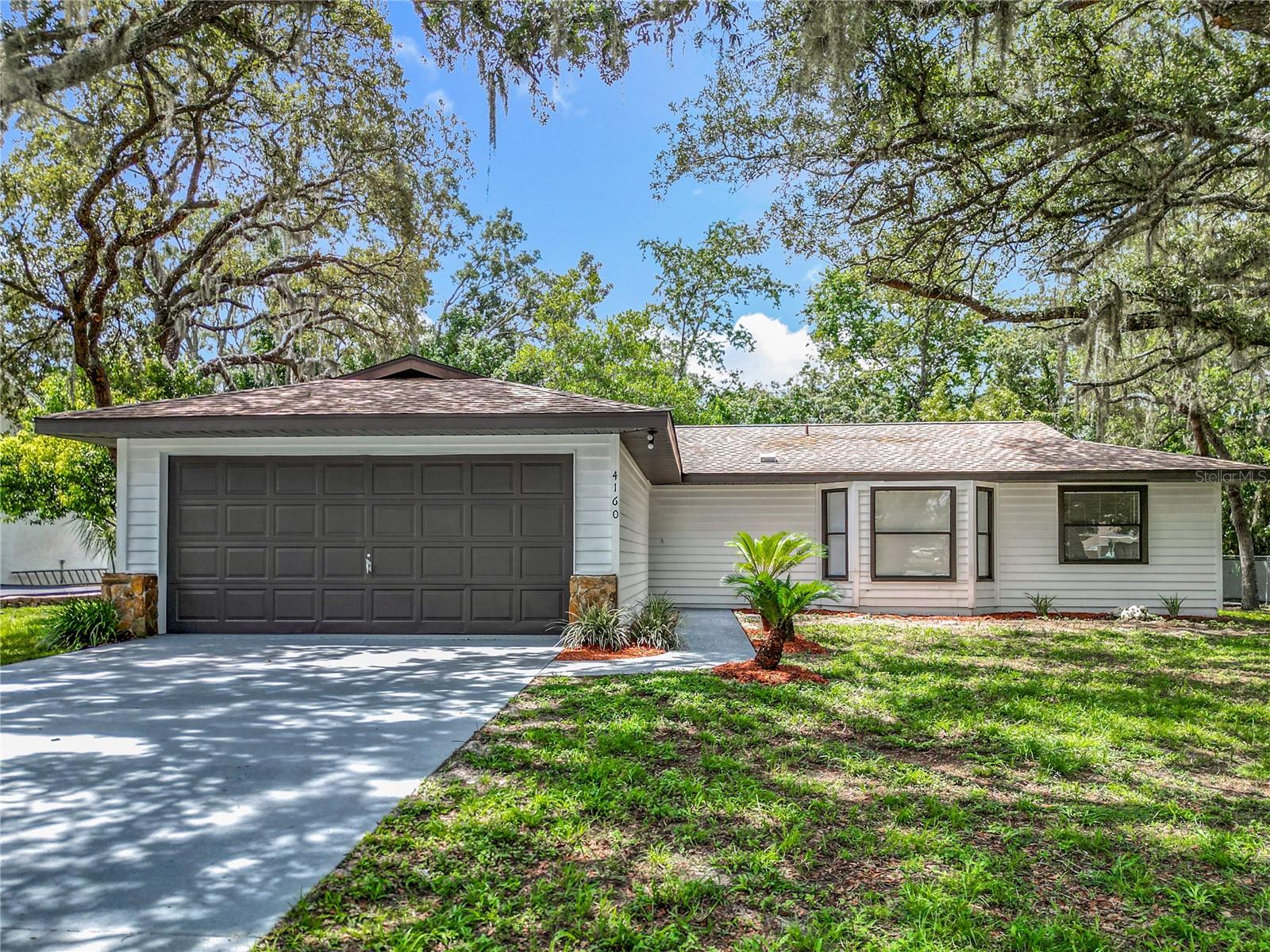 Welcome to this beautifully remodeled home with a pool in the heart of Homosassa! This 3-bedroom, 2-bath property offers the perfect blend of modern comfort and style. Enjoy a spacious backyard ideal for outdoor gatherings, along with a refreshing pool for Florida’s sunny days. The home features a 2017 roof, 2018 HVAC system, fresh interior and exterior paint, new vinyl flooring throughout, brand-new cabinets, stainless steel appliances, and elegant quartz countertops. Located just minutes from natural attractions like Homosassa Springs Wildlife Park, Monkey Island, and the Chassahowitzka National Wildlife Refuge, this home is perfect as a primary residence or vacation retreat. A true gem—move-in ready and made for enjoyment!