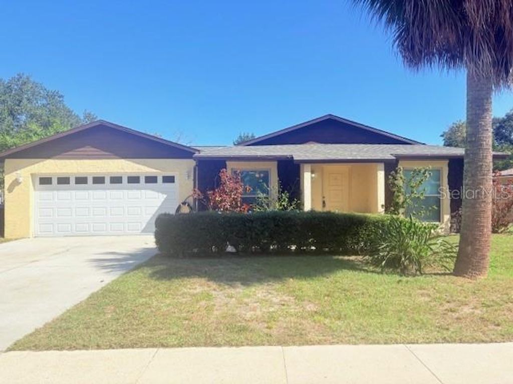Photo of 6239 Fox Hunt Trail, Orlando, FL 32808 (MLS # O6355730)