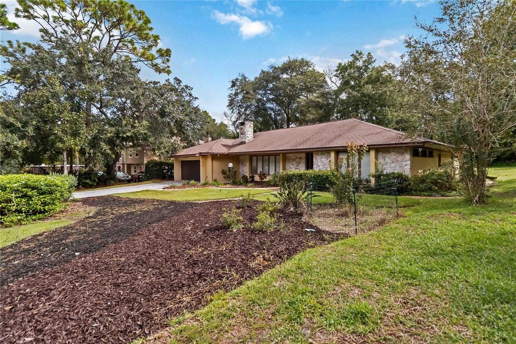 Photo of 310 Wild Olive Lane, Longwood, FL 32779 (MLS # O6344375)