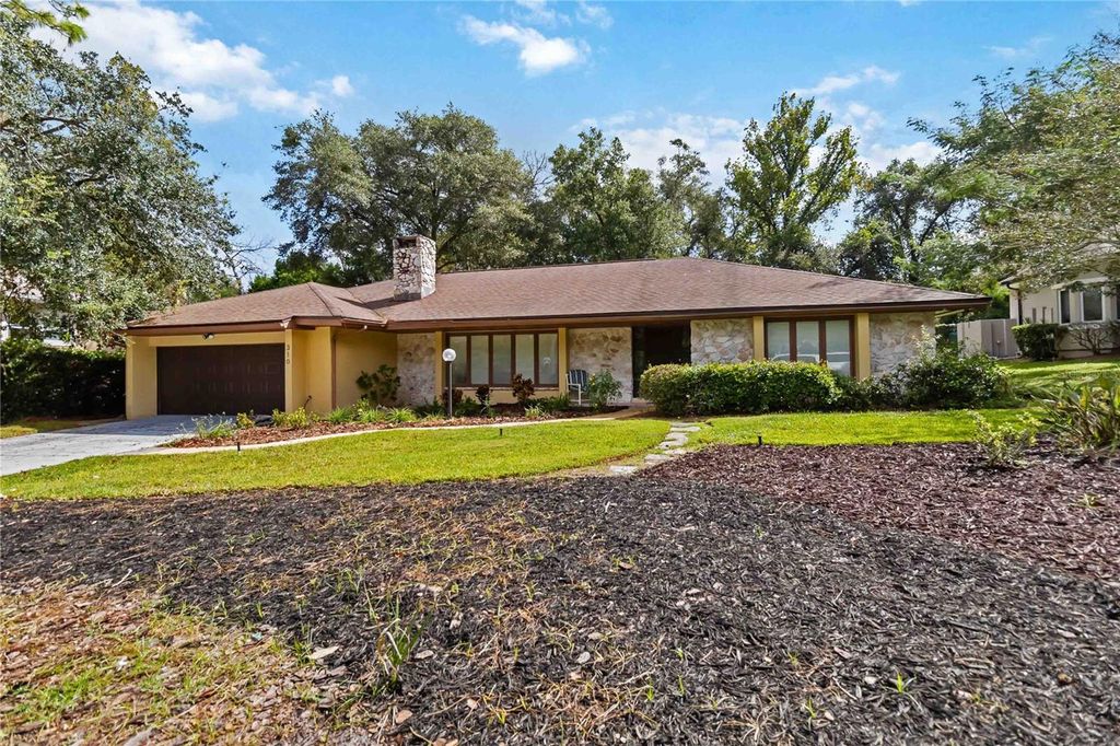 Photo of 310 Wild Olive Lane, Longwood, FL 32779 (MLS # O6344375)