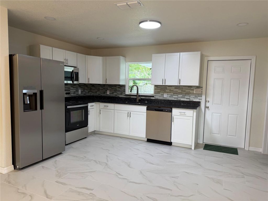 Photo of 39012 Blue Jay Avenue, Zephyrhills, FL 33542 (MLS # TB8432564)