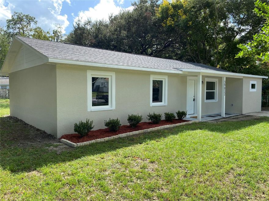 Wow, completely remodeled block home.  4/2 with fenced yard, shed, front and rear porches. New shingle roof, new electrical, new 12x24 tile floors throughout. Additional upgrades include, lights, ceiling fans, shelves, cabinets, granite counters, stainless steel appliances, drywall, texture, paint, insulation, AC, toilets and more. City water & sewer for utilities. This home is turn-key. It is located within the city limits of Zephyrhills, there is no HOA or CDD fees and it is a short drive to all the conveniences. In addition beaches, theme parks, professional sports, airports, malls and much more all within a reasonable drive time. Hurry!