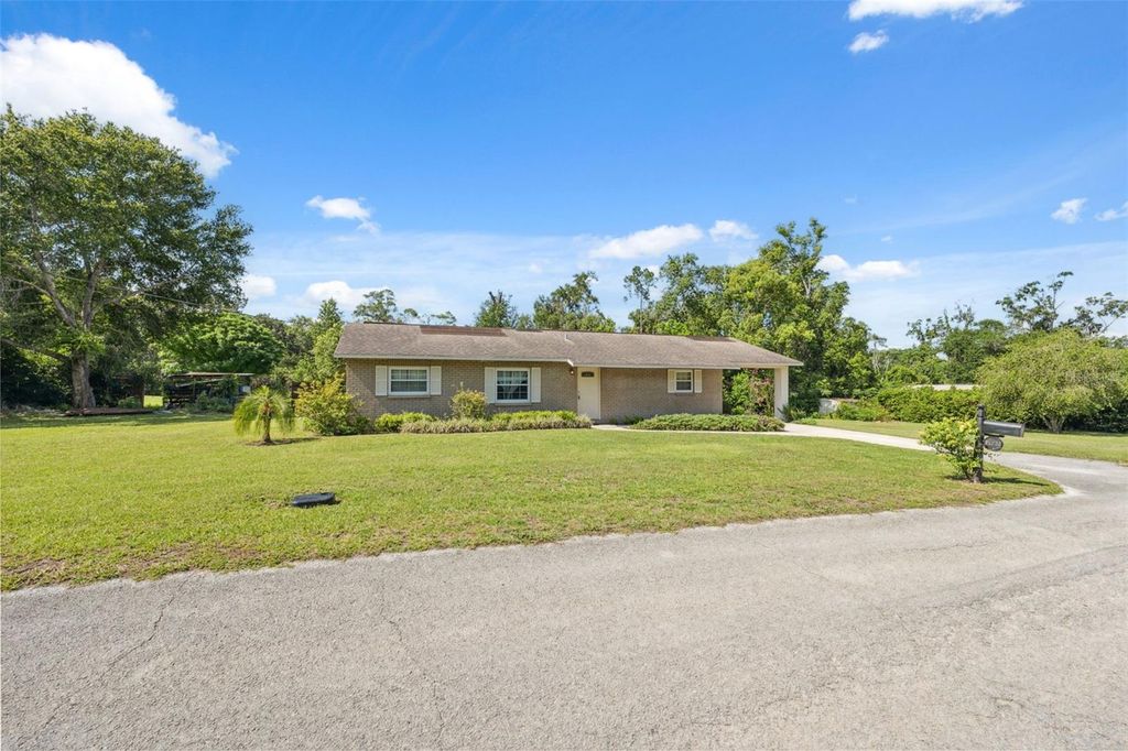 Photo of 37722 Granada Avenue, Dade City, FL 33525 (MLS # W7876757)