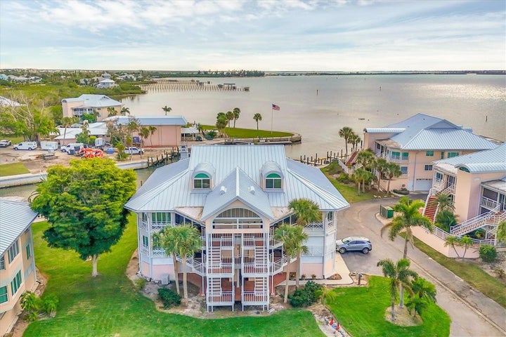 Enjoy expansive views of the Intracoastal & marina from your private residence