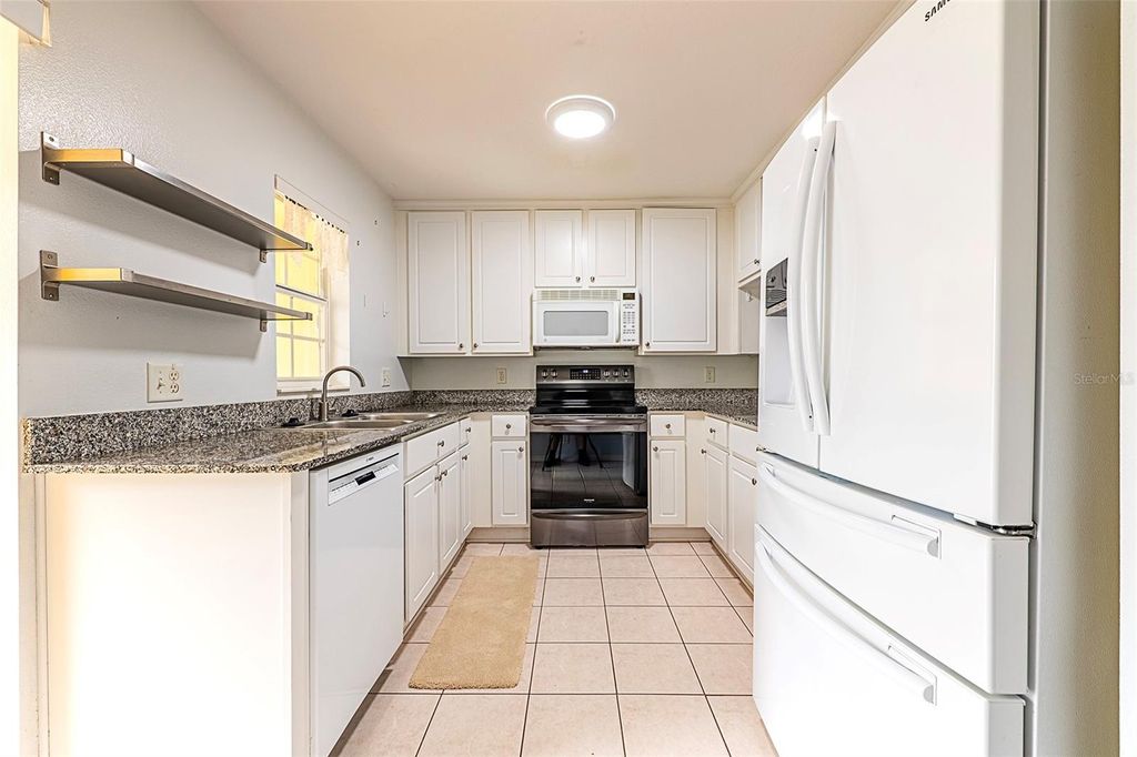 Photo of 170 Coquina Bay Drive, St Petersburg, FL 33705 (MLS # TB8448028)