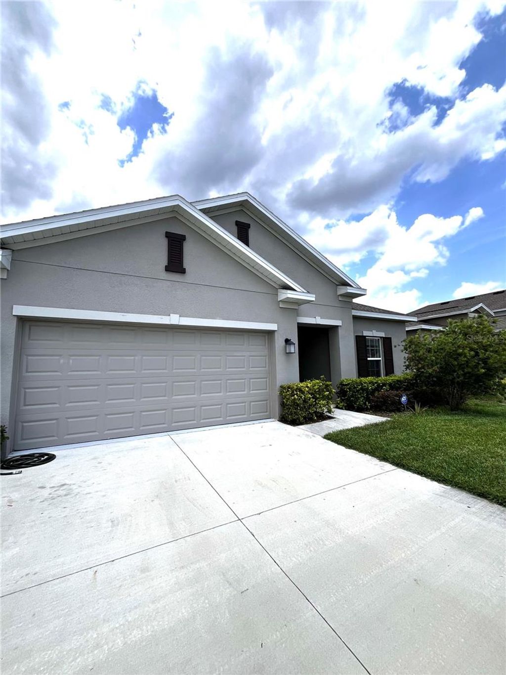 Photo of 832 Daring Drive, Davenport, FL 33837 (MLS # O6357401)
