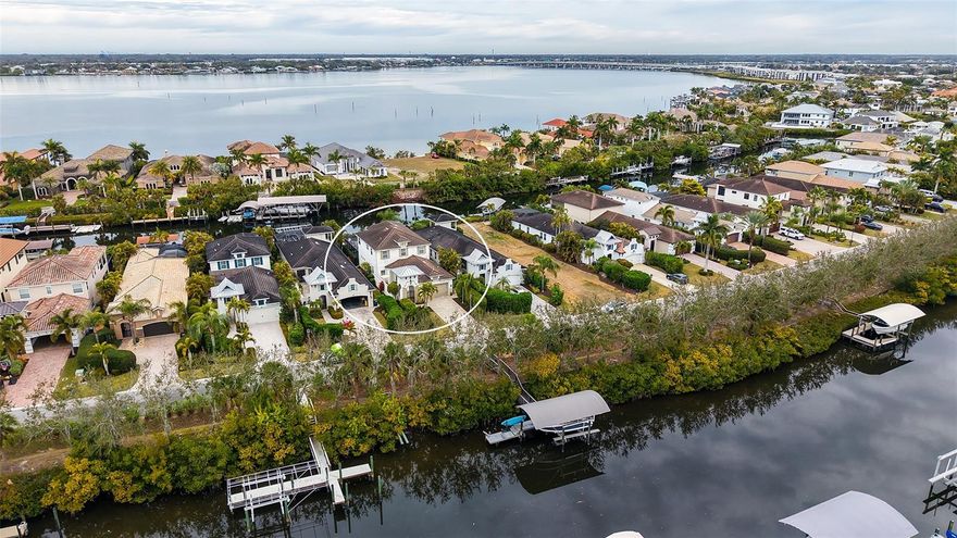 PERFECT ~ A Sarasota / Bradenton Waterfront Home / Property ~ The Much Sought After: Gated - Bella Sole Waterfront Community ~ A Boaters Paradise ~ Deeded Covered Private Dock Area ~ No Bridges To Open Water ~ The Home: A Medallion - Topez Model ~ Private Entrance Courtyard ~ 4-Bedrooms ~ 3-Bathrooms ~ Open Kitchen - Living Area ~ Custom Breakfast Nook ~ Expansive Covered Outdoor Entertainment Area With Pool ~ Fire Pit ~ Private Second Floor Covered Master Bedroom Outdoor Area ~ High Ceilings ~ Updated Bright - Light Indoor Finishes ~ Expansive Garage Area ~ First Floor Bedroom Option ~ Owner Will Consider Selling Boat ~ A Must See In Person ~ Refer to HD Photo Collection - Virtual Drone Tour ~ Ready For Your Visits.