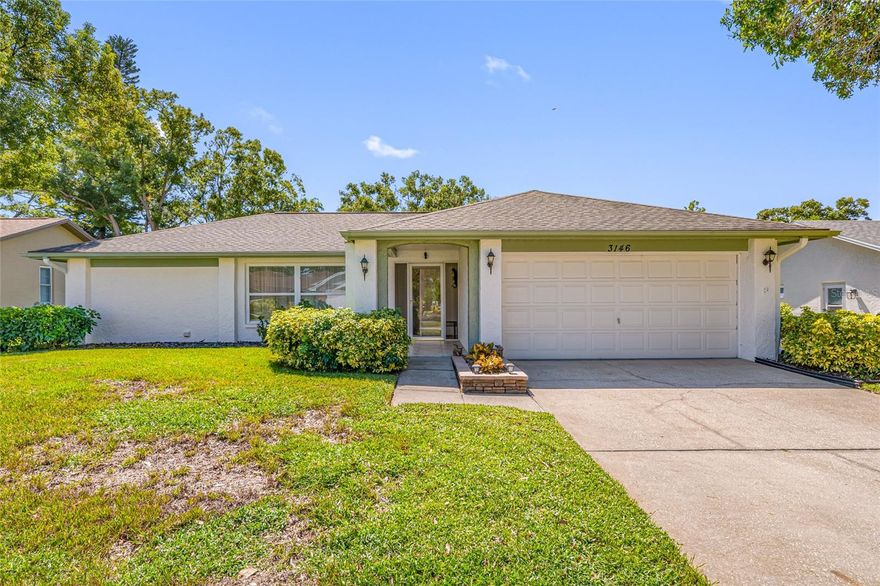 This updated home offers one of the most stunning views in all of Highland Lakes. Nestled on a conservation lot with no rear neighbors, in a non-flood / non-evacuation zone (Flood Zone X) that offers peace of mind alongside its prime location. This well-appointed 3-bedroom, 2-bath split floor plan includes a 2-car garage and showcases serene, picturesque views.  The home is filled with natural light from energy-efficient double-pane windows.  The spacious kitchen boasts granite countertops, and solid wood cabinetry with lots of storage space, opening seamlessly to the dry bar —perfect for entertaining with ease. Both bathrooms have been tastefully updated, with the primary bathroom featuring a walk-in shower with glass doors, and a handy washer/dryer closet. 
Off the third bedroom, which is currently used as office, is a light and bright covered screened-in porch, where you can sit, relax and enjoy the view. Home upgrades include a brand-new electrical panel and water heater (2025), HVAC system (2021) and hurricane shutters for peace of mind. Additional features include a water softener and reverse osmosis system.
Highland Lakes Lifestyle - This vibrant 55+ golf community offers an unbeatable array of amenities for just $164/month:
• Unlimited golf on three 9-hole courses—no green fees
• Heated Olympic-size pool with spa, cabana
• Tennis, pickleball, shuffleboard, and Bocce courts
• Clubhouse with auditorium, meeting rooms, woodworking shop, and arts & crafts studio
Lake Tarpon Lodge Perks - Enjoy access to a second heated pool, open-air patio with grills and tables, boat launch to Lake Tarpon, two community pontoons, and RV/boat storage options—all at the lodge on Lake Side Drive.