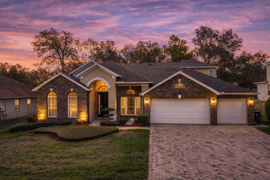 One or more photo(s) has been virtually staged. Welcome to 934 Rock Creek St in Apopka, a stunning pool home located in the highly sought-after Rock Springs Ridge community, where privacy, space, and comfort come together on an oversized 0.37-acre lot with no rear neighbors and peaceful wooded views. From the moment you arrive, the brick elevation, paver driveway, and spacious 3 car garage create a striking first impression. Step inside to a grand foyer with soaring ceilings and a bright, open layout designed for both elegant entertaining and everyday living. The home features 5 bedrooms and 4 full bathrooms, along with multiple flexible living spaces including formal living and dining rooms, a spacious family room, a private office with double French doors, and a den — offering endless possibilities for work, relaxation, and hosting guests. 
At the heart of the home is the beautifully designed gourmet kitchen, featuring 42-inch cabinetry, granite countertops, custom backsplash, built-in appliances, a large breakfast bar, and a walk-in pantry. The kitchen flows effortlessly into the impressive family room with dramatic 20-foot ceilings, creating a bright and inviting space with views of the outdoor oasis. The owner’s suite is conveniently located on the main level, offering a peaceful retreat with tray ceilings, a sitting area, and sliding glass doors that open directly to the pool area. The luxurious owner’s bathroom features dual vanities, a spacious walk-in shower, and a relaxing soaking tub. A guest bedroom with a full bathroom downstairs provides the perfect setup for visitors or multi-generational living. Upstairs you’ll discover an incredible bonus space that serves as the 5th bedroom, complete with its own full bathroom and walk-in closet. This versatile area can easily transform into a home theater, game room, private guest suite, or the perfect retreat for a college student. Step outside and experience your private resort-style backyard. The home features a custom swimming pool and spa surrounded by a large paver pool deck, deck jets, and a spacious covered lanai, creating the ideal setting for entertaining, relaxing, or enjoying Florida’s beautiful weather year-round. The fully fenced backyard and natural wooded backdrop provide exceptional privacy. This home has been meticulously maintained and thoughtfully upgraded, including:
• Top-of-the-line refrigerator 1 year old
• Bosch dishwasher 1 year old
• Brand new stove
• First-floor AC system (inside and outside units) replaced less than 3 months ago
• Water softener system
• Whole-house water filtration system less than 1 year old
• Roof replaced less than 3 years ago
The location is unbeatable — just minutes from Wekiva Parkway - 414, shopping, dining, and outdoor recreation including Field of Dreams Sports Complex, local trails, amphitheater events, and nearby state parks. Enjoy the convenience of being about 25–30 minutes from Disney and major Orlando attractions while still living in a peaceful community with a small-town feel. The home is also located in the highly rated Kelly Park K-8 school zone. Homes with this combination of space, upgrades, privacy, and outdoor living rarely become available in Rock Springs Ridge. Come experience it for yourself.
