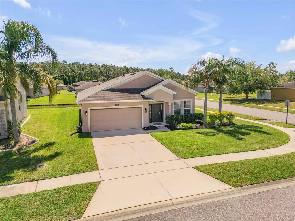 Photo of 5321 Peach Blossom Boulevard, Port Orange, FL 32128 (MLS # O6400329)