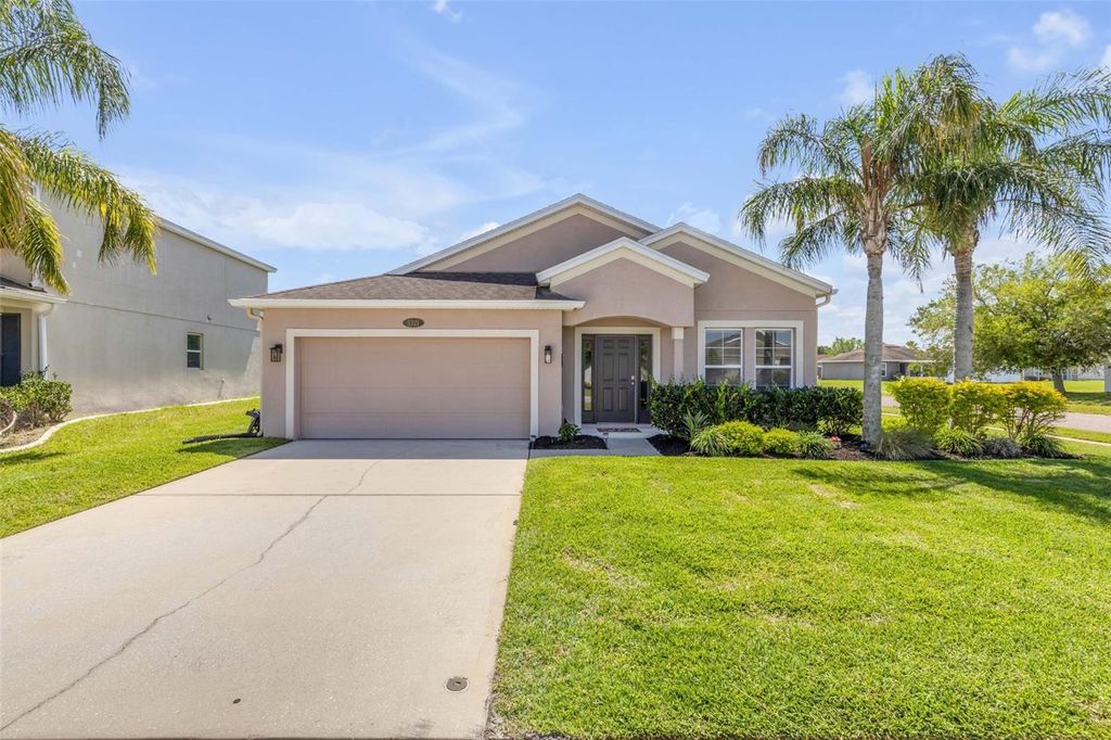 Photo of 5321 Peach Blossom Boulevard, Port Orange, FL 32128 (MLS # O6400329)