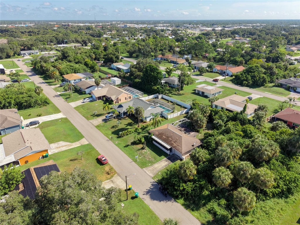 Photo of 2094 Carpetgreen Street, Port Charlotte, FL 33948 (MLS # C7530564)