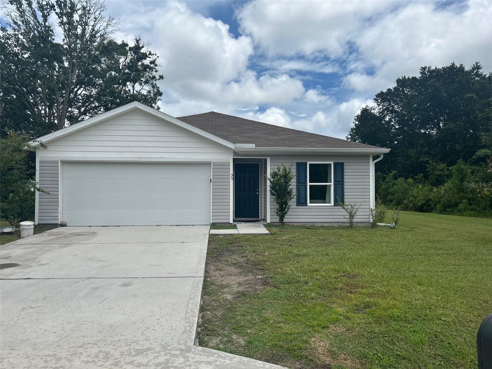 Why wait to build when you can have it all now! Welcome to this charming 4-bedroom, 2-bathroom home built in 2020 located in the heart of Palm Coast’s desirable Lehigh Woods. It’s perfect for first-time homebuyers, retirement or those seeking a cozy family retreat. Nestled on a quiet street, offering almost one-third of an acre with a large backyard with ample room for a pool, playground, garden or outdoor entertainment space, making it an ideal setup for families and hosting guests. Also, if you like to biking, you can step right out your back door to the bike trail.
Inside, you’ll find an inviting open floor plan which flows effortlessly from the kitchen space to the living room, ideal for entertaining or relaxed family evenings. The kitchen is well-equipped with all appliances, lots of cabinets, separate pantry for storage, ample counter space for meal prep and a large deep kitchen sink for easy cleanup.
The split floor plan gives the master quarters some added privacy, making it a peaceful retreat with a large closet and a private bathroom with a new step in shower. Also, offers three additional bedrooms provide flexibility, whether you need a home office, guest rooms, or space for a growing family. A second full bathroom is conveniently situated near these bedrooms for easy access.
Washer and Dryer (which are included) are located in the hallway which could easily be moved to the garage leaving you with a very large space for and extra closet or an additional pantry. This home also offers a whole house water softener, sprinkler system and an attached 2 car garage providing plenty of room for parking and storage.
Just minutes to the Town Center where you will find an array of shopping and dining options. Flagler beach with its beautiful sun, sand and ocean is just a fifteen-minute ride away. Also, conveniently close to two hospitals, schools and parks and easy access to US1, making it both a comfortable and convenient place to call home. Don’t miss the opportunity to make this home yours—schedule your showing today!